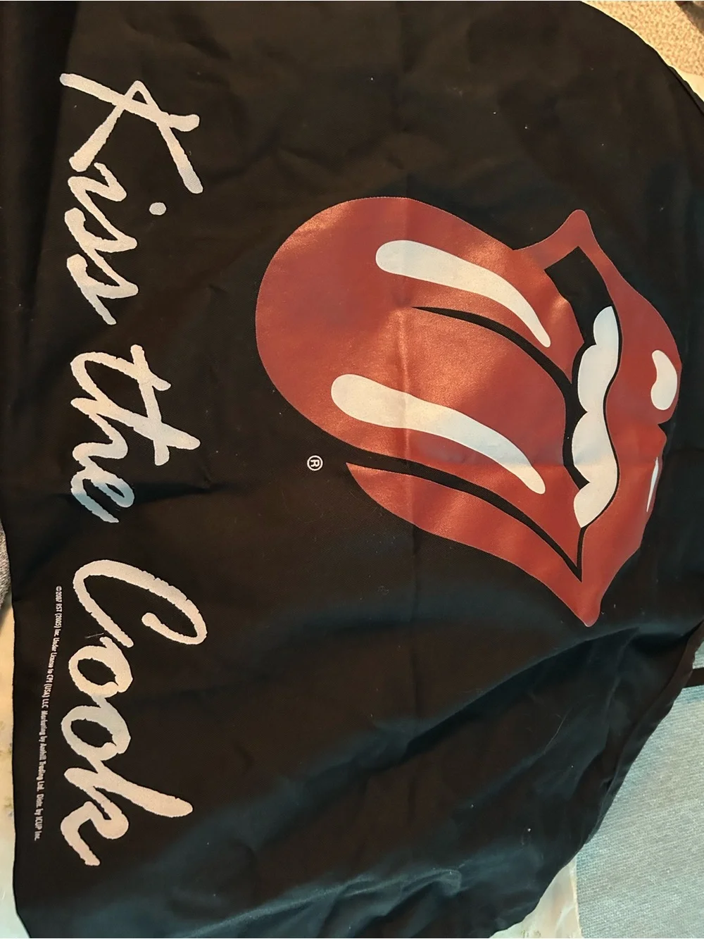 the Rolling Stones Black Apron with Red Tongue Graphic